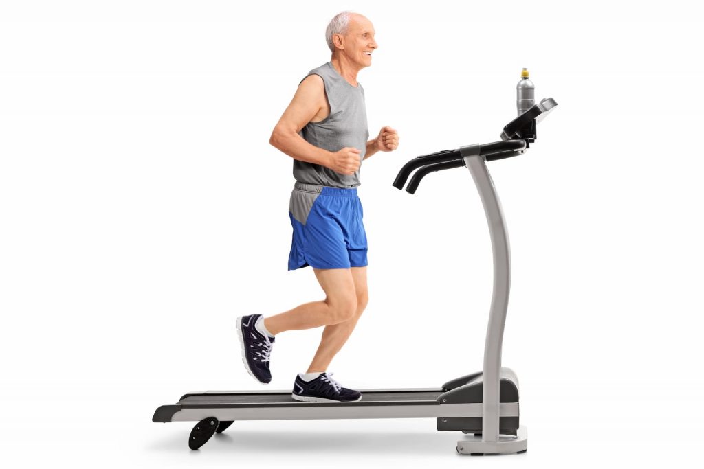 Elderly man running on treadmill